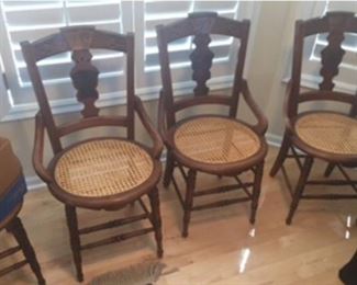 Fantastic set of four antique parlor chairs with cane seats and burled accents