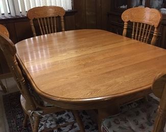 Oak Dining Table Seats Up to Eight, Two Large Leaves, Eight Chairs
