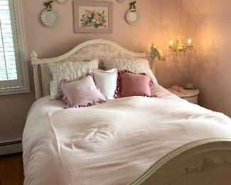 girls bed with toile upholstered headboard