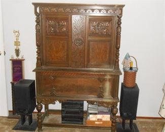 Vintage china cabinet with ornate skirting, crown and legs