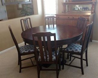 Pedestal Table and six chairs (sold seperately)