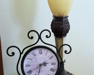 Metal scoll stand clock.  Candlestick uplight lamp