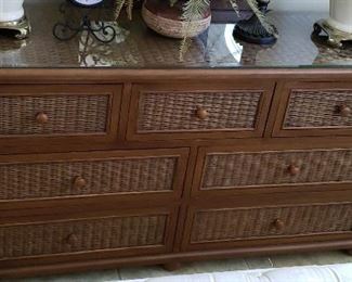 Close up of  7 drawer dresser with glass top- matches queen bedroom set