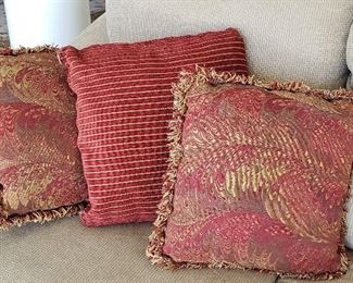 Tassell trim and striped throw pillows