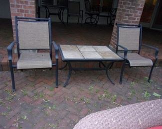 Patio tile top table and two chairs