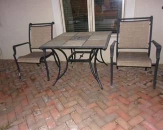 Patio tile top table and two chairs