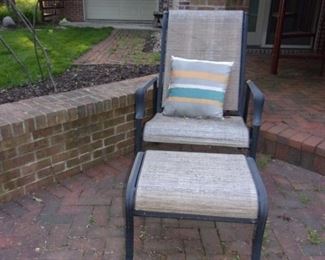 Pair of matching reclining recliner patio chairs with ottoman/stool