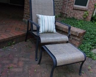 Pair of matching reclining recliner patio chairs with ottoman/stool