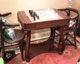 Vintage game table with two chairs. Rug not for sale.