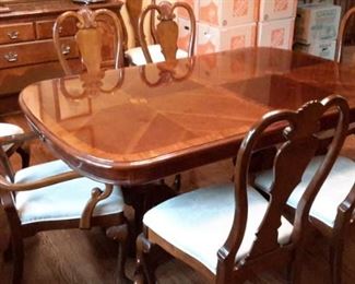 Stunning formal dining room with double pedestal table with 6 chairs, buffet and china cabinet