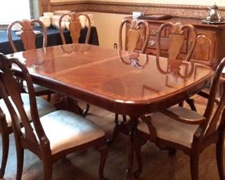 Stunning formal dining room with double pedestal table with 6 chairs, buffet and china cabinet