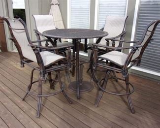 Quality Luxury brand Castelle Patio Table and Four swivel bar chairs $1,000. OUR PRICE OBO/New it is over $5,000 Table alone new is $1,100.00 see link https://www.patioliving.com/castelle-sienna-tables-cast-aluminum-round-patio-bar-table-pfdch42 Similar Chairs over $1,200 each see link https://www.patioliving.com/castelle-resort-fusion-sling-dining-patio-bar-stool-pf9d99