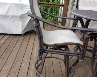 Quality Luxury brand Castelle Patio Table and Four swivel bar chairs $1,000. OUR PRICE OBO/New it is over $5,000 Table alone new is $1,100.00 see link https://www.patioliving.com/castelle-sienna-tables-cast-aluminum-round-patio-bar-table-pfdch42 Similar Chairs over $1,200 each see link https://www.patioliving.com/castelle-resort-fusion-sling-dining-patio-bar-stool-pf9d99