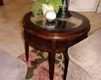 Beveled edge glass top end table with  shelf