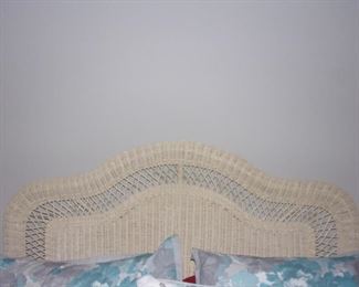 Queen off-white wicker headboard.