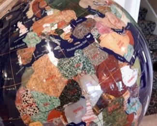 Globe with precious stone inlay