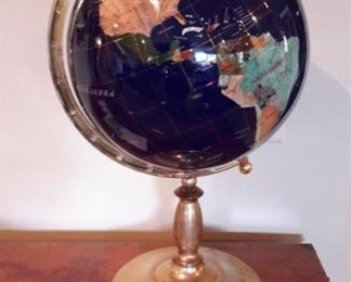 Globe with precious stone inlay