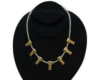 32. Gold and Emerald Necklace with Aztec Figural Motif