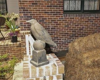 217. Cast Garden Statue in the Form of a Bird Resting on a Ball Topped Plinth