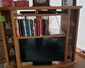 TV stand, mantle clock (TV and books not available)