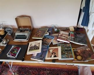 Coffee table books, vintage typewriter, folding table