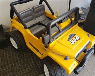 Battery-operated toy jeep for kids to ride on