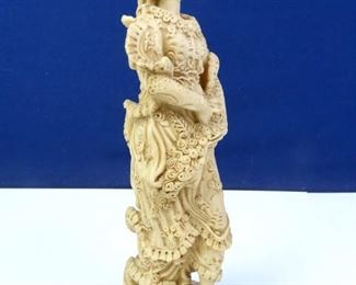 Statuette of a Woman in a Dress