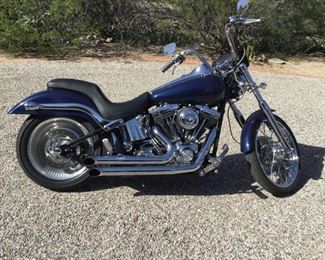 2002 Harley Soft tailed deuce.  14,600 miles, ridden once a week. Beautiful midnight blue,  $8000. 