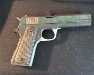 TELEVISION PROP HANDGUN, Colt Government Model Automatic Caliber .45. This is a television prop, there is no trigger. 