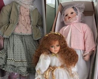 Dolls, 26", 16", 22" in height from left to right. 