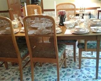 Table, 6 chairs, lcane back eaves,