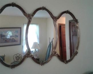 Triple mirror-the ironing board reflection is a nice touch-hmm?