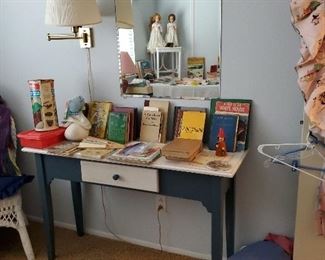 Side table in kids room with vintage books