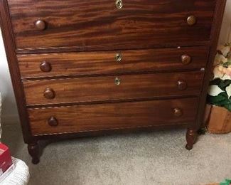 1800's flaming mahogany chest of drawers / desk (with key) 