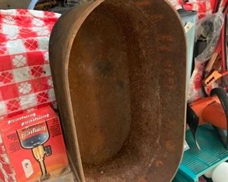 #70 black iron oval pot as is $25.00