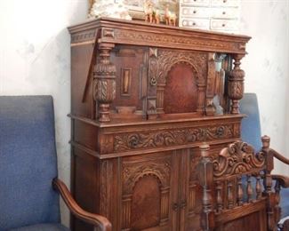 HEAVILY CARVED CABINET