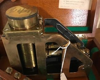 Circa 1944 solid brass Clinometer in original case.