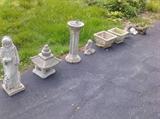 Lots of stone outdoor decorations, gnomes, wishing well, Waterfall and more