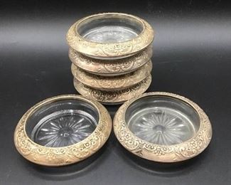 Six Sterling Silver and Glass Coasters https://ctbids.com/#!/description/share/157190