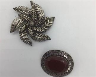 A Pair of Sterling Silver Pins https://ctbids.com/#!/description/share/157234