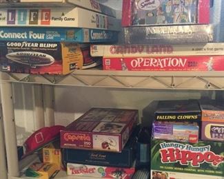 Vintage board games, many are complete. RISK missing one clear plastic box. Inside Moves and The Simpsons MIB. 