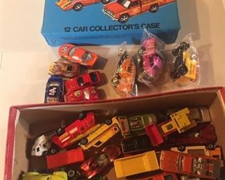 Assorted Hot Wheels and Match Box cars. Hot Wheels collector case.