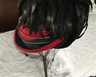 Ladies vintage hat
Vintage Feathers 
This hat would be a show stopper for the Red Hat Society 