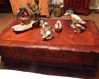 Matching chest (like the side tables) used as a coffee table along with a "Duck" collection