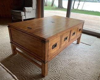 Another coffee table with compartment lift up
