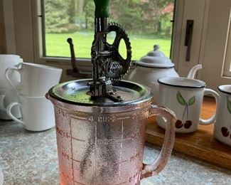 Pink Depression Measuring Cup with Green Handled Wooden Beater