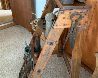 Primitive collection including this very story ladder.  Amazing piece