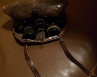 Vintage binoculars in soft leather case