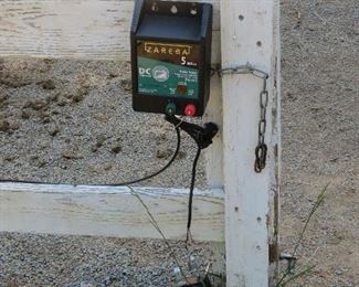 ELECTRIC FENCE. RATED FOR 5 MILES LONG.