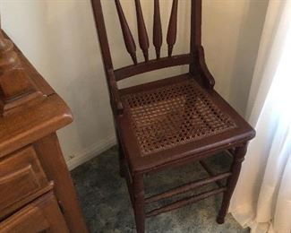 Antique chair with cane seat